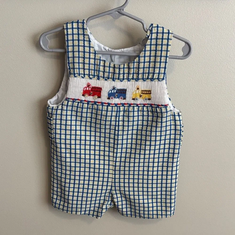 House of hatten smocked firetruck Baby Romper size 12 months ( up to 24 lbs)